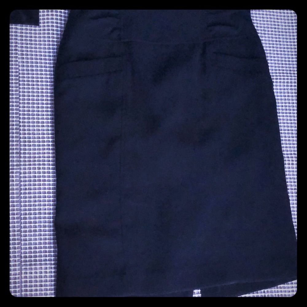 Black skirt to the knee